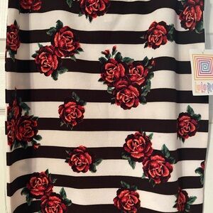 Lularoe skirt. Brand new. Black and white striped with roses